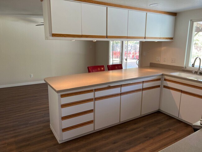 Building Photo - Four bedroom two bathroom home with a pool in Central Davis