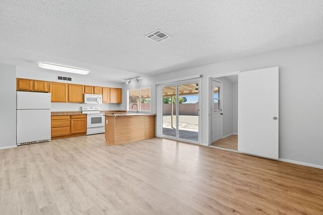 Building Photo - Three bedrooms plus big garage!