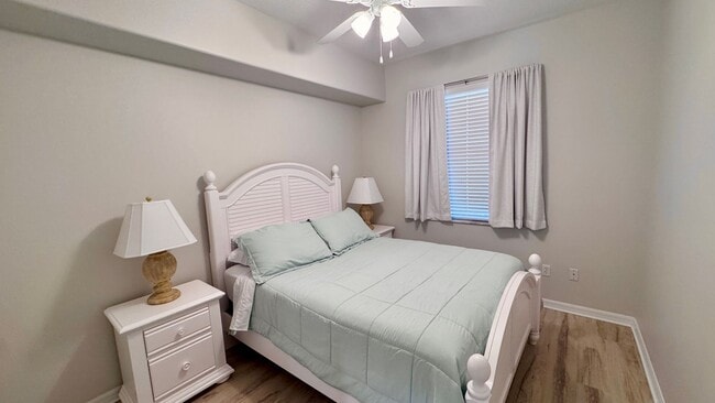 Building Photo - Elevated Luxury at The Terraces – 4th Floor Lake & Golf Course Views! 55+ Community!