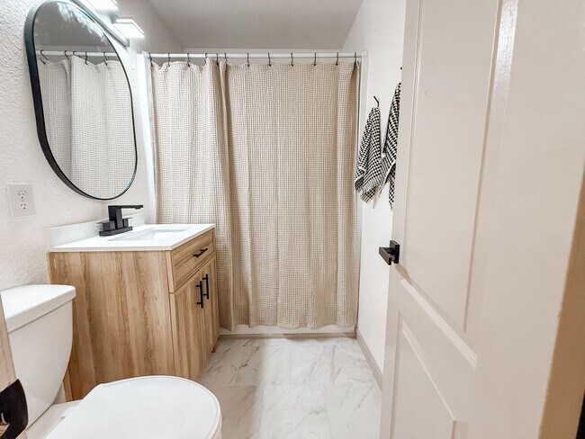 Primary Photo - Charming Riverside Home with Modern Upgrad...