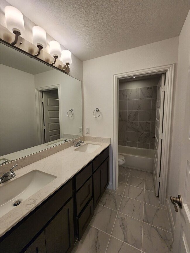 Building Photo - Move-in Special: 50% off second full month...