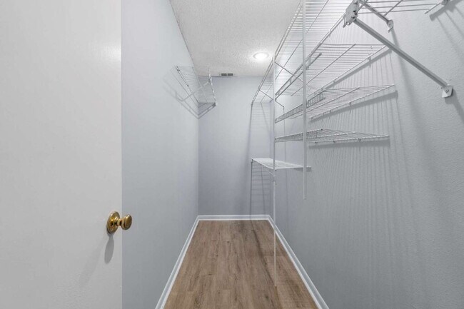 Building Photo - Freshly Updated 2BR Condo with Private Balcony, Community Pool, & In-Unit Laundry