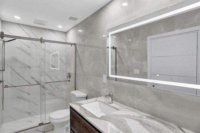 Building Photo - 8816 Collins Ave