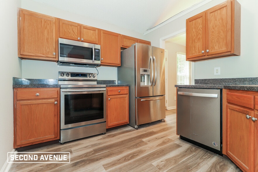 Building Photo - 905 Woodwind Dr