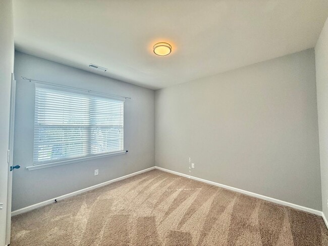 Building Photo - Modern, Luxurious 3BD, 2.5BA Cary Home with Solar Panels & Detached 2-Car Garage with EV Charger ...