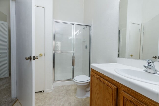 Building Photo - Refurbished upstairs two bedroom in well maintained East side gated complex