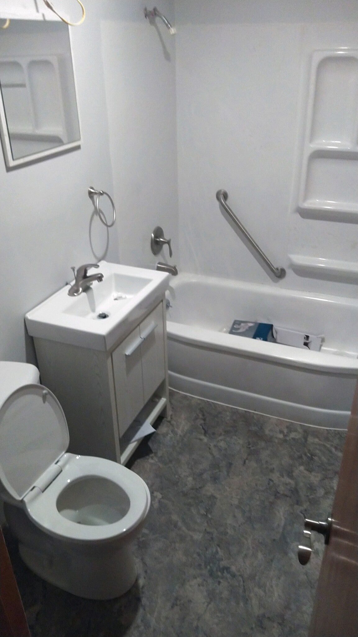 new toilet, vanity, flooring - 515 3rd Ave NW