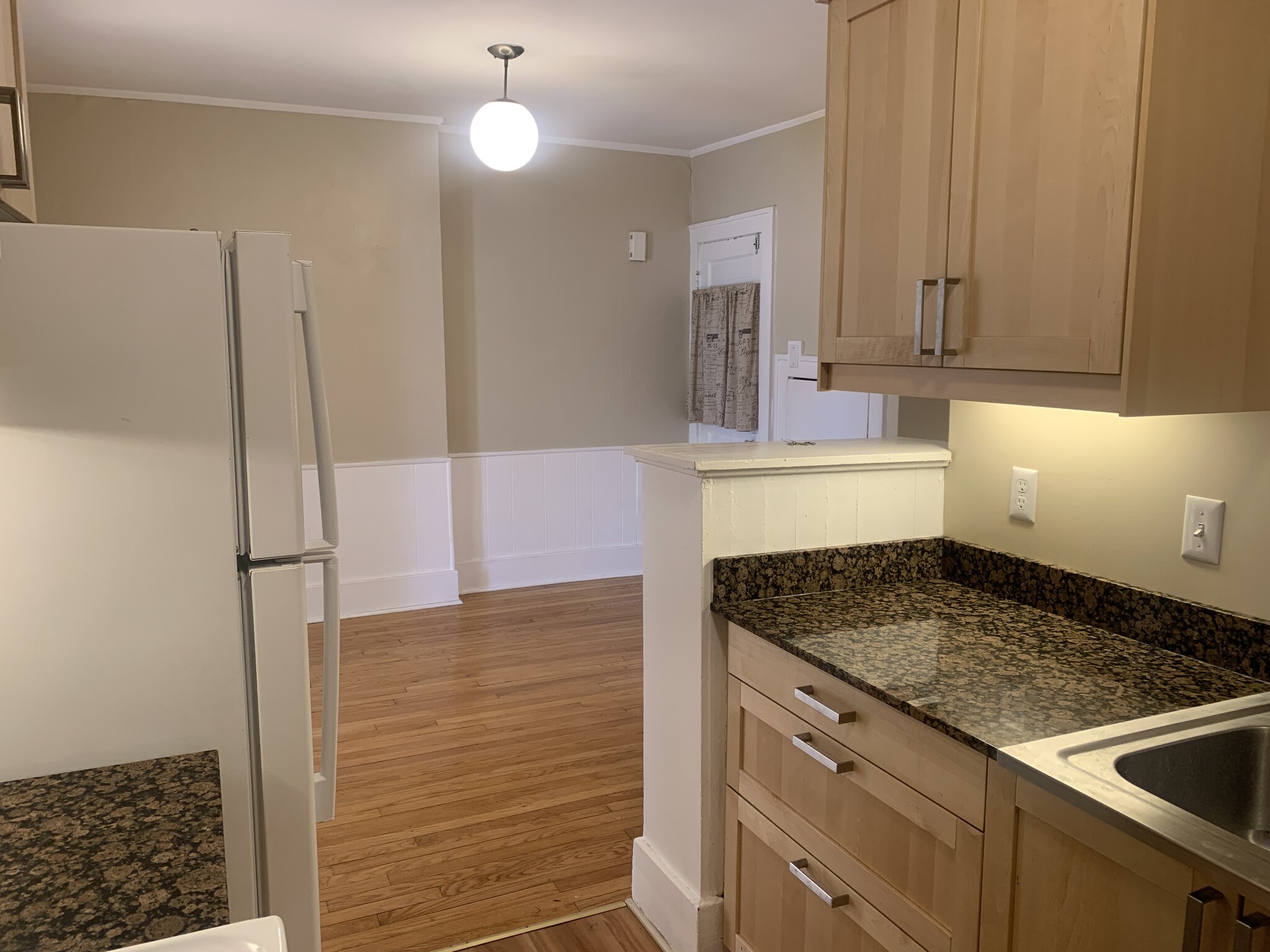 View from the kitchen into the dining room - 602 W 3rd St