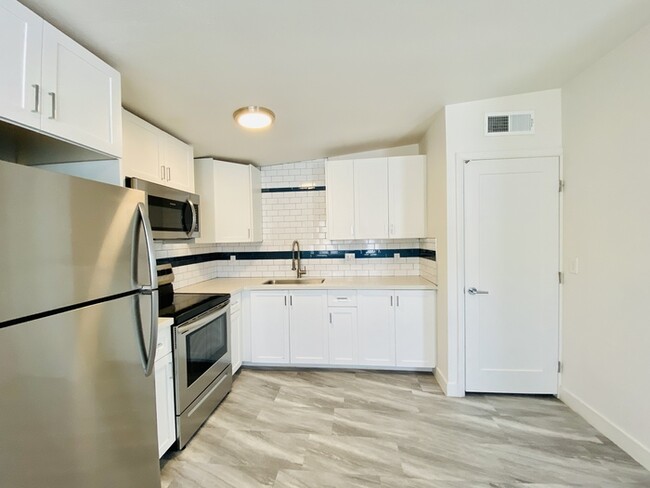Building Photo - Modern living in this completely remodeled...