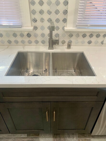 stainless double sink - 1426 E Florida St