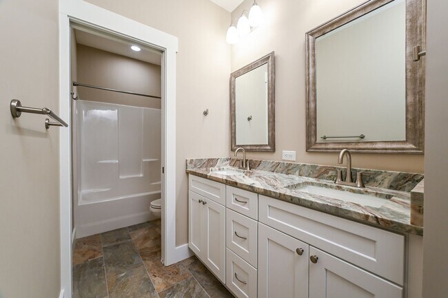 Building Photo - Beautifully Updated 3 Bedroom Home with Sunroom, Two-Car Garage, and Upscale Finishes