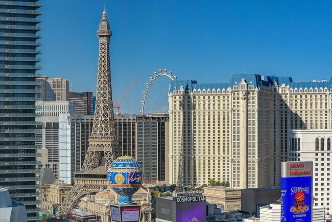 Building Photo - Stunning Strip Views from this Fully Furnished Studio Residence.
