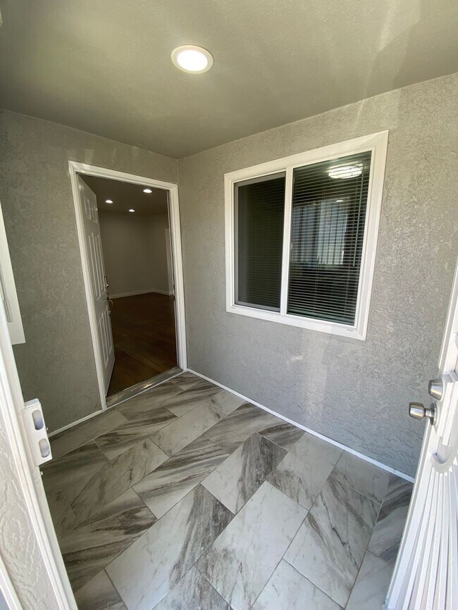 Building Photo - Remodeled 4 Bedroom Norwalk House For Rent with AC!