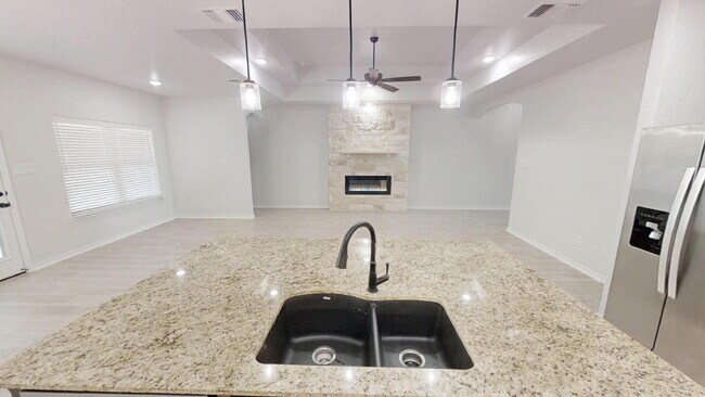 Building Photo - Welcome home to this beautifully designed 4-bedroom, 2.5-bathroom gem!