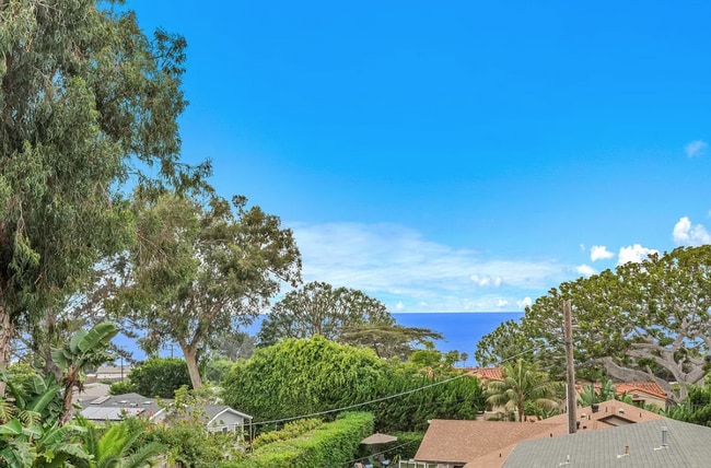 Building Photo - Unfurnished Village of Del Mar Home Boasti...