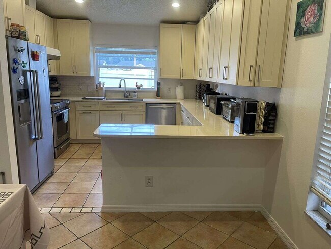 Building Photo - 9727 Cypress Shadow Ave