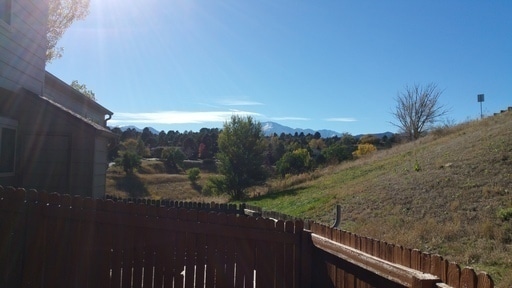 Building Photo - Charming 2 BR/2BA Townhome in Prime Rockrimmon Location!