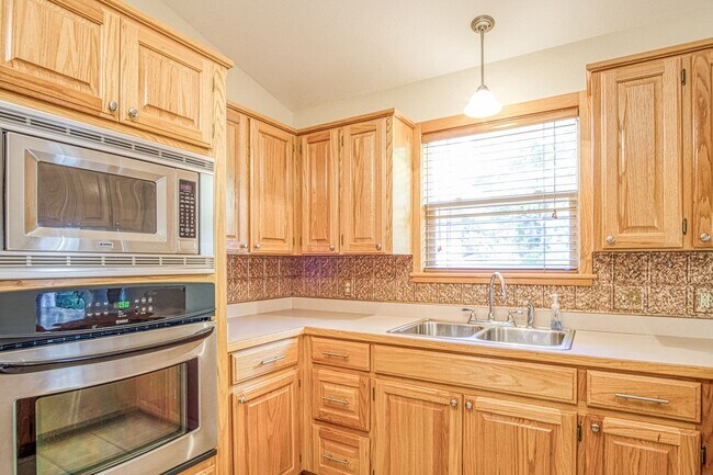 Building Photo - This beautiful home is located in a quiet private neighborhood and perfect for a serene living at...