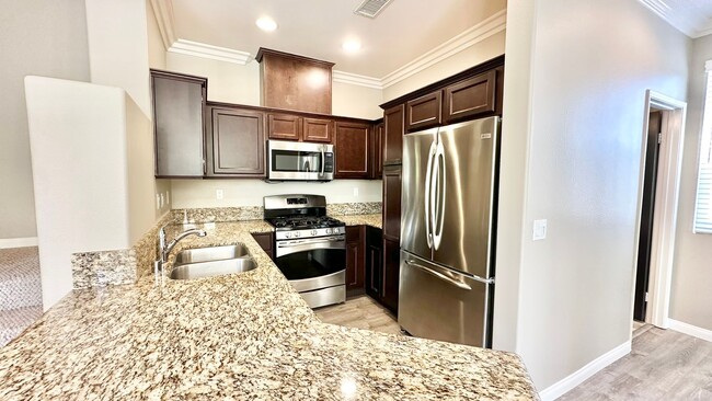 Building Photo - Beautiful, Newer, Townhome with Attached 2...