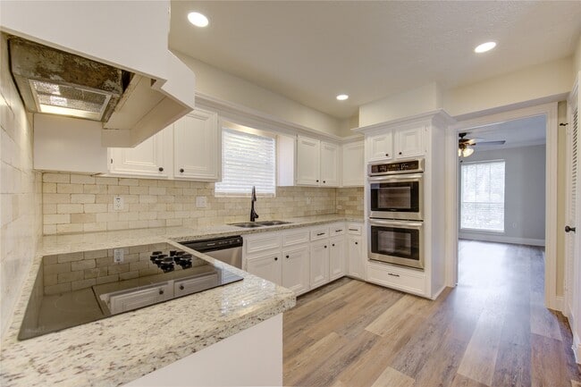 Building Photo - 9115 Taidswood Dr