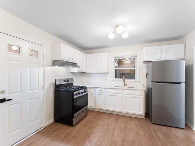 Building Photo - Fully Renovated 4-Bedroom Home with Large Fenced Yard in Clayton