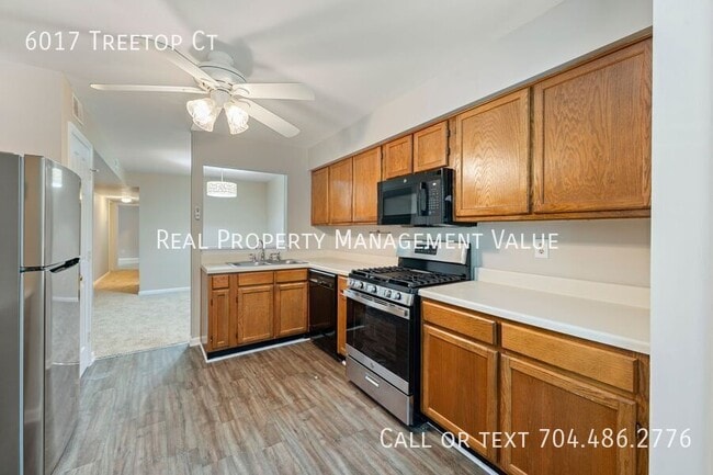 Building Photo - 6017 Treetop Ct