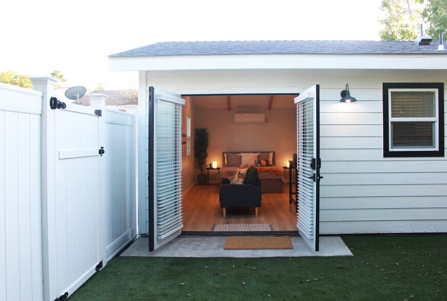 French doors open to allow a lot of natural light inside. - 2147 S Orange Dr