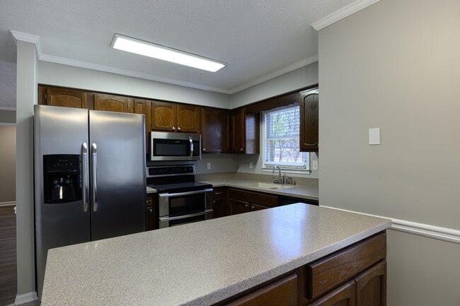 Building Photo - Move-In Ready Brick Ranch on Wooded Acre in Hampton Woods!