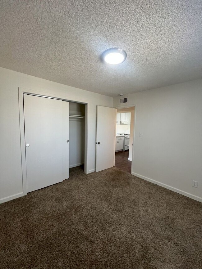 Building Photo - Upstairs unit Available Soon!