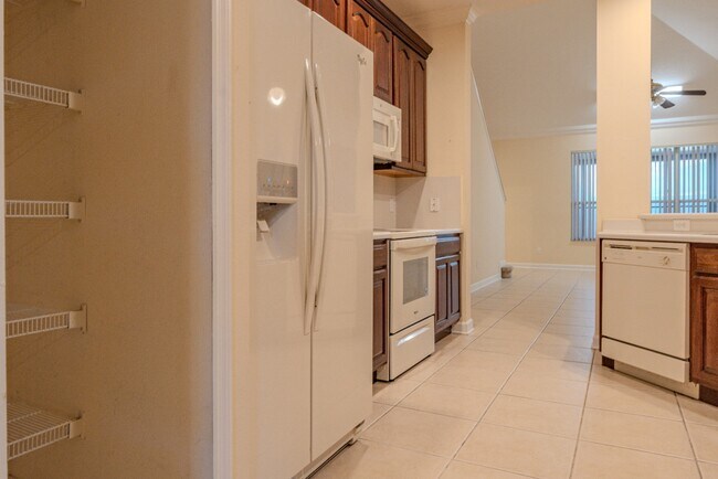 Building Photo - Spacious 5BR Home in Falcon Trace | 3-Car Garage | Screened Patio | Resort-Style Amenities Rent: ...