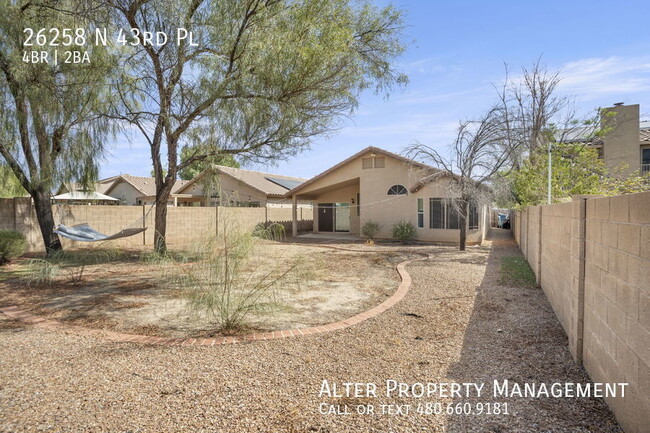 Building Photo - NEWER QUARTZ 4BR 2B