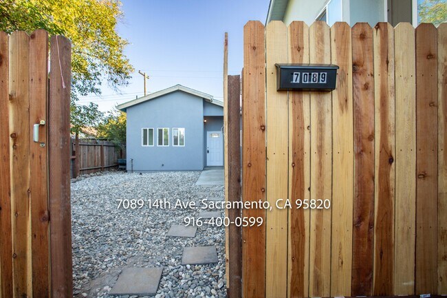 Building Photo - 7089 14th Ave