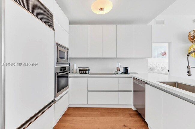 Building Photo - 6799 Collins Ave