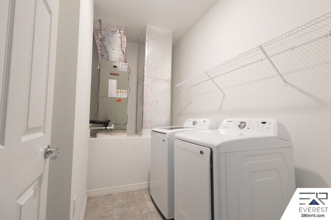 Building Photo - Modern 3-Bed, 2-Bath Townhome with Private Yard & 2-Car Garage