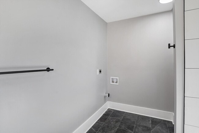 Building Photo - MOVE IN SPECIAL - Modern, Chic and brand new 2 bedroom with an office -   Discover This Home That...