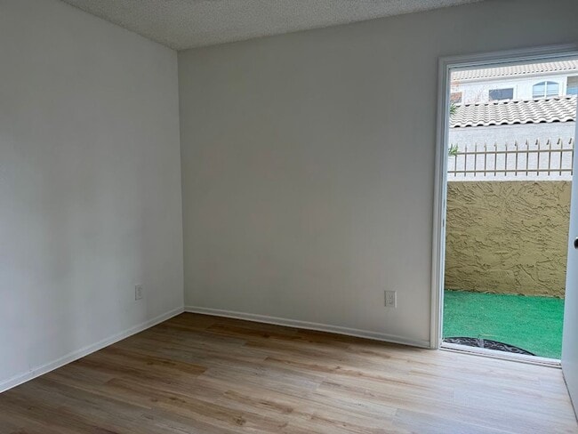 Building Photo - NOW OFFERING $400 OFF MOVE-IN COSTS Utilities Included – First Floor – In-Unit Washer/Dryer
