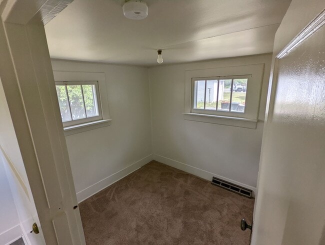 Building Photo - Centrally Located Home on Corner Lot with Small Pets Considered