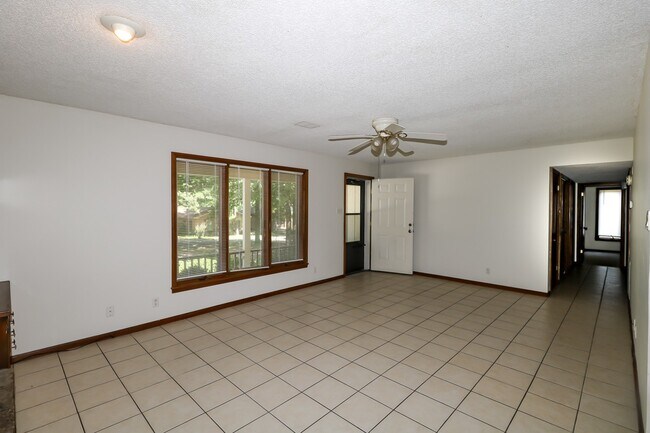 Building Photo - Two Bedroom, 2 Bath, 1-Car Garage, 1179 sq ft feet home with wood burning fireplace. and screened...