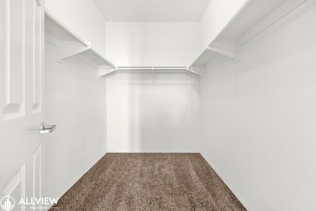 Building Photo - Spacious Coastal Condo with Rooftop Ocean ...