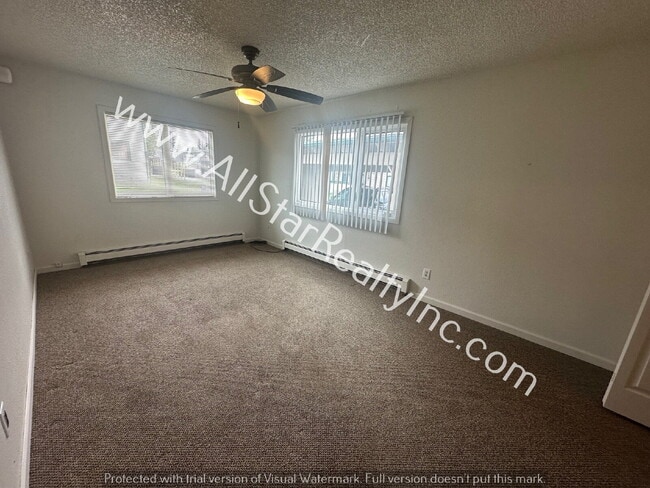 Building Photo - 8110 E 16th Ave