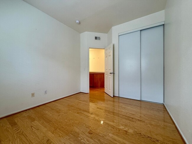 Building Photo - Spacious 3 Bedroom 2.5 Bath Townhouse with Private Garden Patio & a Community Pool/Spa! Attached ...
