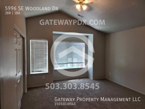 Building Photo - 5996 SE Woodland Dr