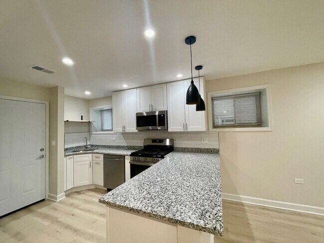 Building Photo - 4845 N Kostner Ave