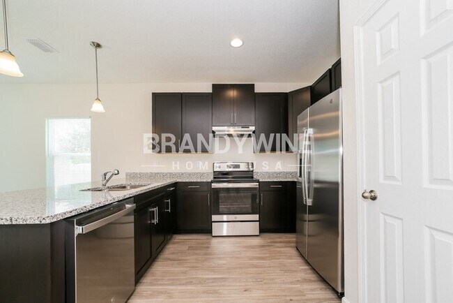 Building Photo - 520 Narnia Ct