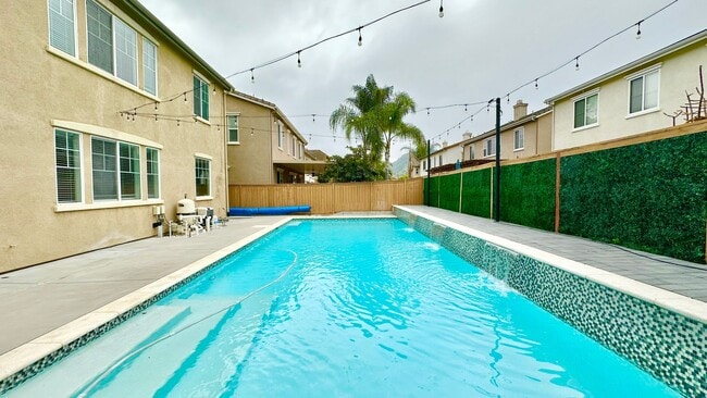 Building Photo - Beautifully Updated Two-Story Home in Lake Rancho Viejo Community, complete with Pool & Solar!