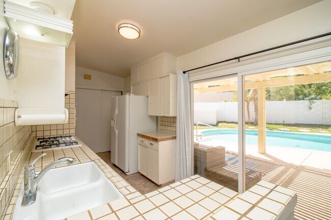 Building Photo - Spacious 2-Bedroom Home with Private Pool & Office In the Cove!
