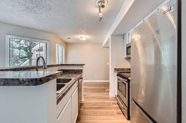 Building Photo - MOVE-IN SPECIAL ($500): Spacious Condo wit...