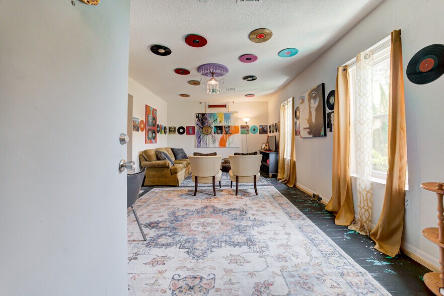 Vinyl Loft Living - 117 W Harrison Ave