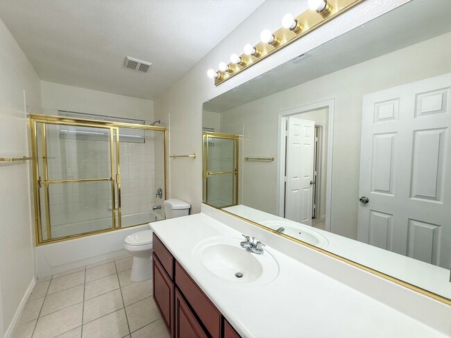 Building Photo - SPACIOUS HOME IN GATED COMMUNITY WITH POOL, RV PARKING & 4-CAR GARAGE!