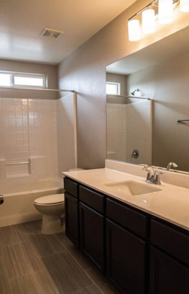 Building Photo - COMING SOON Beautiful 4 bedroom SW Area Ho...